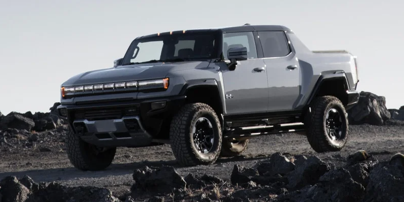 A photo of a grey 2025 GMC HUMMER EV pickup.