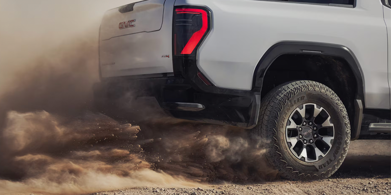2026 GMC Sierra EV in it's lower back side profile